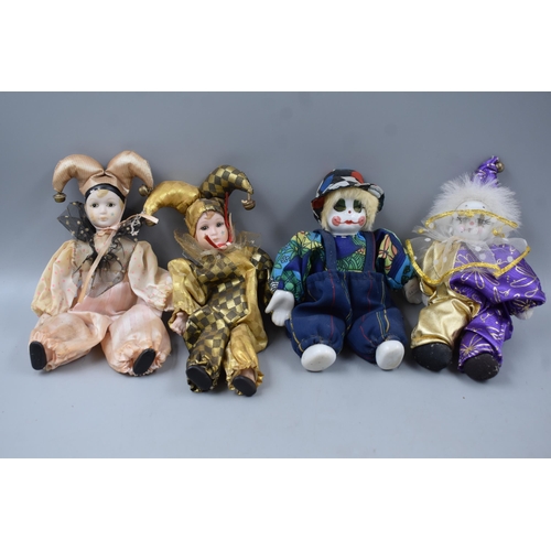 442 - Two Leonardo Collection Porcelain Dolls In Boxes And Four Small Clown and Jester Dolls.