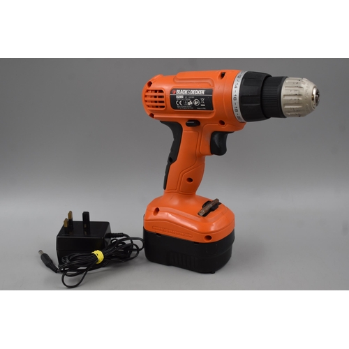 556 - Pair of Black and Decker Tools to include Grinder, and Cordless Drill with Charger both working when... 