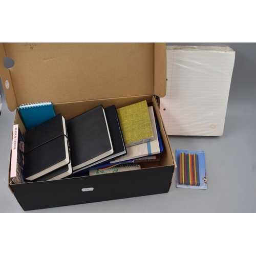 586 - A Box Containing A Selection Of Stationary Items. Includes Notebooks And Lined Paper.