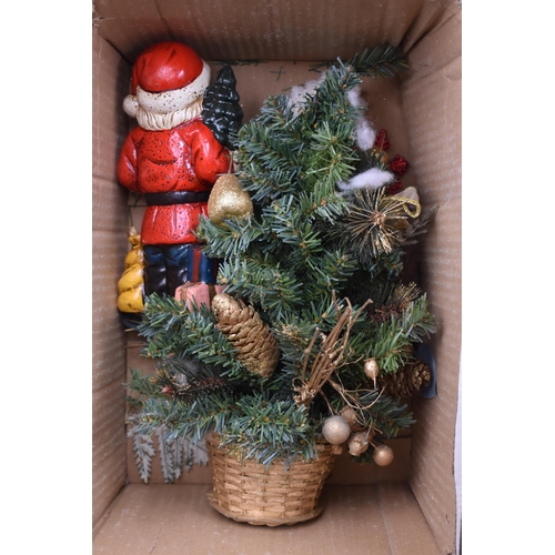 626 - A Selection Of Christmas Decorations. Includes Santa Statues, Christmas Tree, Stockings and More.