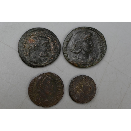 124 - A Selection of Four Roman Coins.