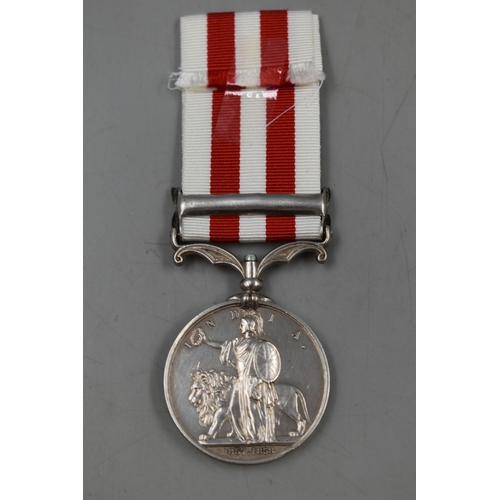 148 - Victoria Indian Mutiny (1857 to 1858) Silver Lucknow Medal Complete with Ribbon (Awarded to Gunner A... 