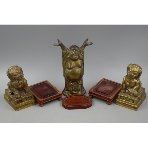 174 - Three Brass Statues on Wooden Stands, Includes Two Lions and a Buddha. Tallest Approx 8