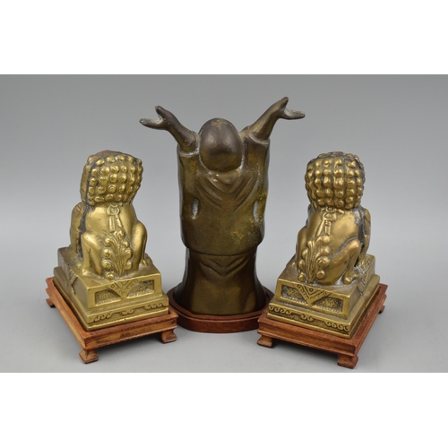 174 - Three Brass Statues on Wooden Stands, Includes Two Lions and a Buddha. Tallest Approx 8