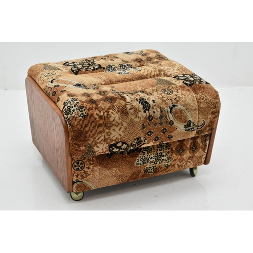 442 - G-Plan Saddleback footstool on castors (one castor damaged)