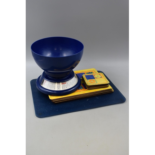 669 - A Mixed Selection of Kitchen Items To Include Glass Cutting Board, Weighing Scales and Placemats Wit... 