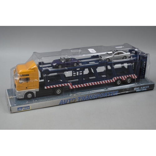 512 - Six Sealed Eddie Stobart Die-Cast Scale Models including Scania, Ford, Konecranes and Volvo with a S... 