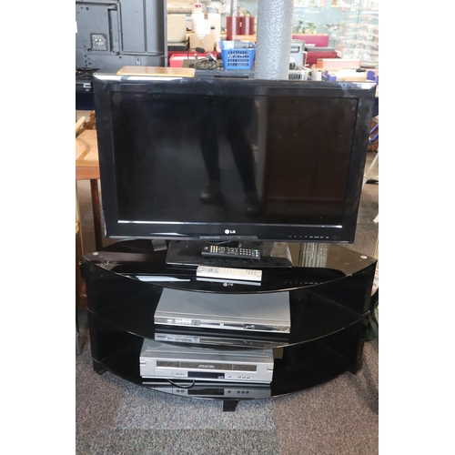 558 - LG flat screen TV model 32LS3400, 32 inch screen, with remote, powers up Complete With TV Stand ,DVD... 