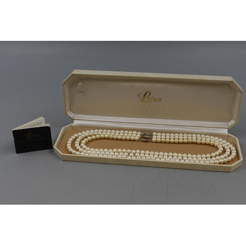 53 - Lotus Box Containing Three Faux Pearl Necklaces