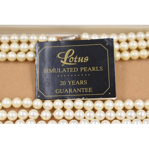 53 - Lotus Box Containing Three Faux Pearl Necklaces