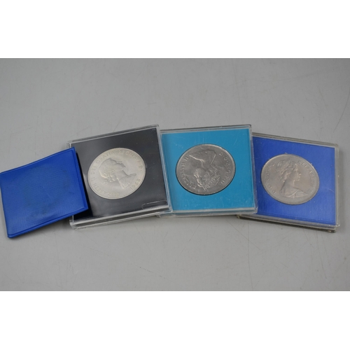 103 - Selection of Four Commemorative Crown Coins to include Churchill, Silver Jubilee and The Royal Weddi... 