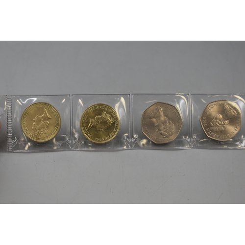 117 - A Selection of Four Collector's Coins. Includes Two 2 Pound Coins and Two 50p Coins.