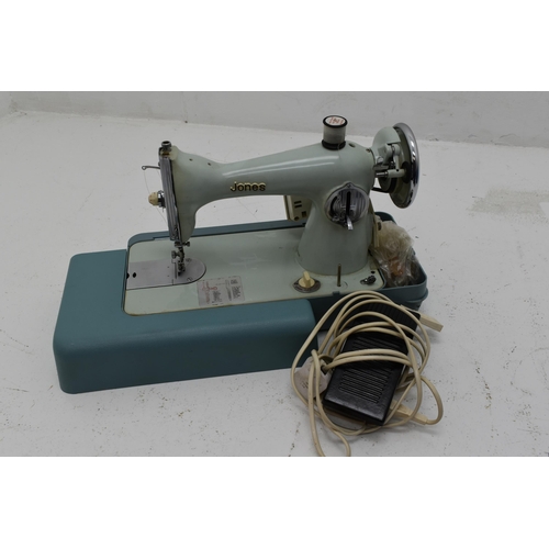 410 - Cased Jones Sewing Machine With Foot Pedal . Untested House Clearance Item