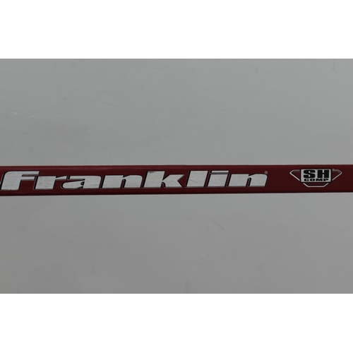 411 - A Pair of Franklin Street Hockey Sticks, With a Baseball Bat (32