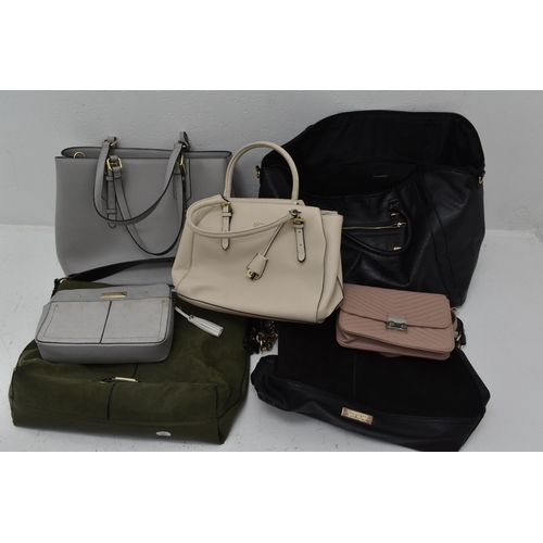 642 - A Selection of Seven Ladies Handbags and Holdalls.