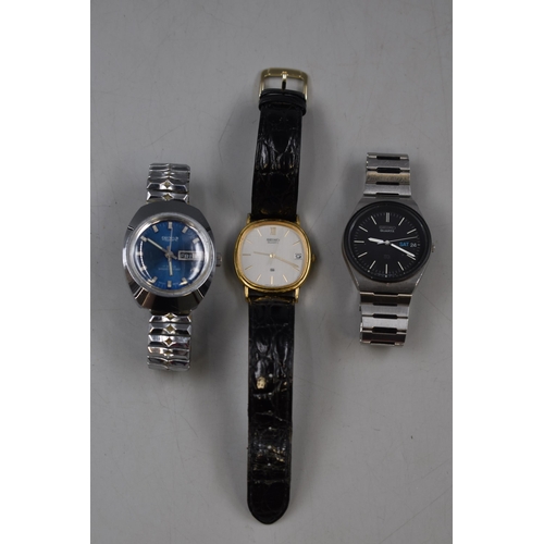 69 - Three Gents watches to include two Seiko ( both appear to be working ) and One Geneva sport