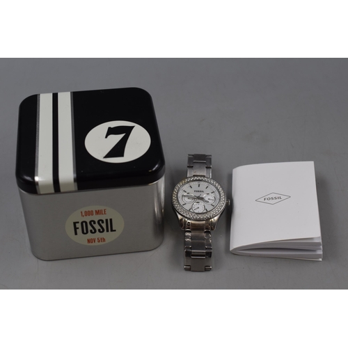 77 - Boxed Ladies Fossil Watch with Mother of Pearl Face Ticking away nicely and in original Tin with ins... 