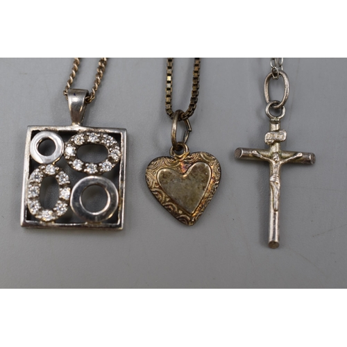 6 - Three Silver Pendants on Silver Chains, Includes Crucifix, Heart and Other.