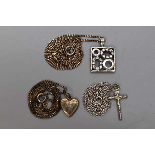 6 - Three Silver Pendants on Silver Chains, Includes Crucifix, Heart and Other.