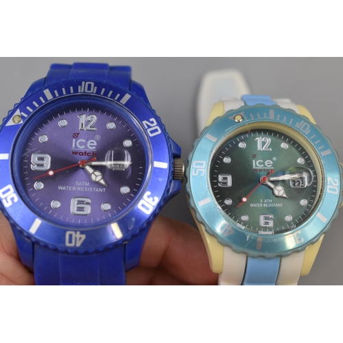 64 - Two Ice Travel Clocks and two Wrist Watches with Rubberised Straps (All Working)