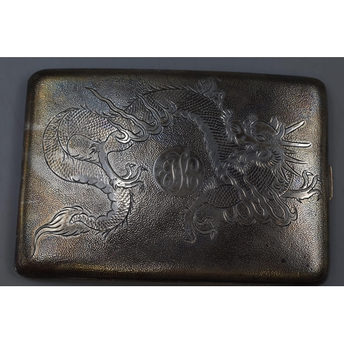 8 - Chinese silver cigarette case, rectangular and curved, the hinged lid with dragon chasing pearl, mar... 