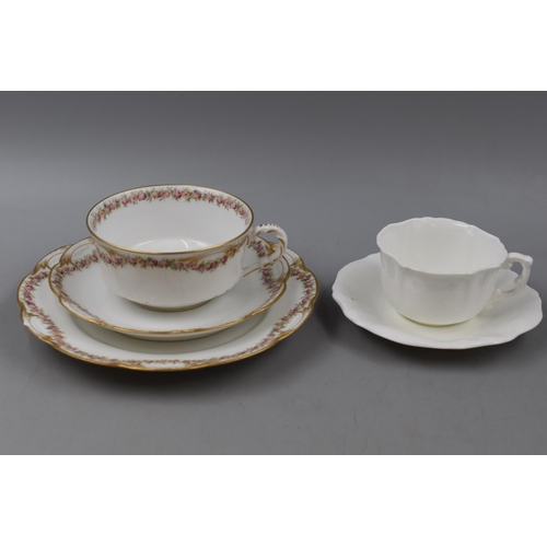 276 - A Haviland Limoges Rose Pattern Twenty-Three Piece Tea Set, With A Four Piece Hammersley Cup and Sau... 