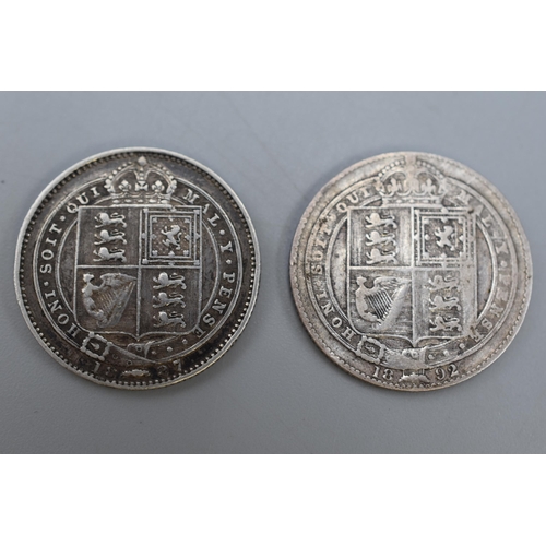 132 - Two Silver Victorian Shillings, 1887 and 1892.