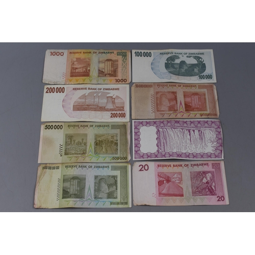 141 - A Selection of Eight Zimbabwe Banknotes.