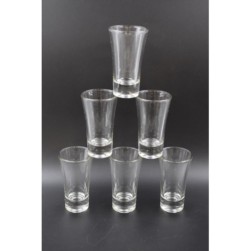 164 - A Boxed Set of Six Heavy Shot Glasses.