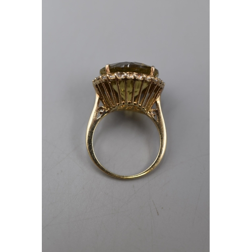 35 - A 925. Silver Ring With Large Yellow Stone.