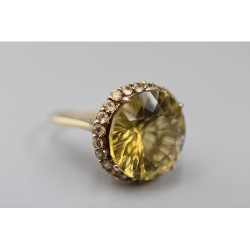 35 - A 925. Silver Ring With Large Yellow Stone.