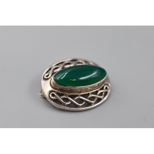 49 - A Celtic Style 925. Silver Brooch With Central Green Stone.