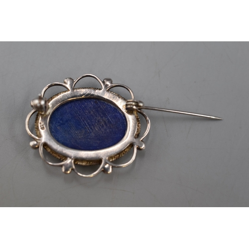 56 - A Silver 925. Brooch With Large Central Blue Stone.