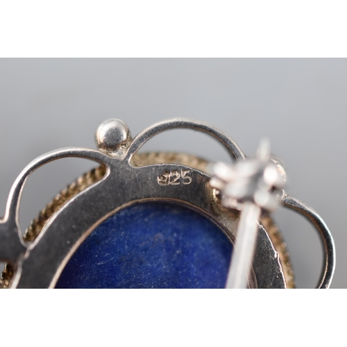 56 - A Silver 925. Brooch With Large Central Blue Stone.