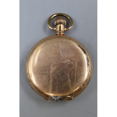 74 - A Waltham 10ct Rolled Gold Dennison Case Hunter Pocket Watch. Free Balance a/f