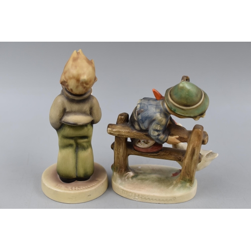 135 - A Pair of Hummel Goebel Figures. Includes Boy on Fence and Choir Boy.