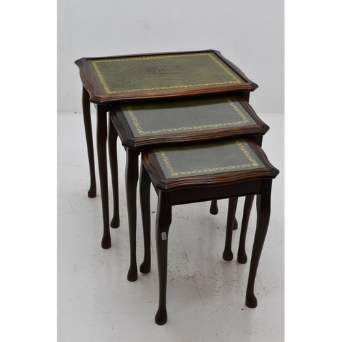 634 - A Nest of Three Green Leather Inlaid Tables, One Missing Glass Top. Approx 22