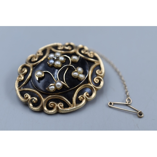 31 - A Victorian Gold Plated Mourning Brooch With Chain.