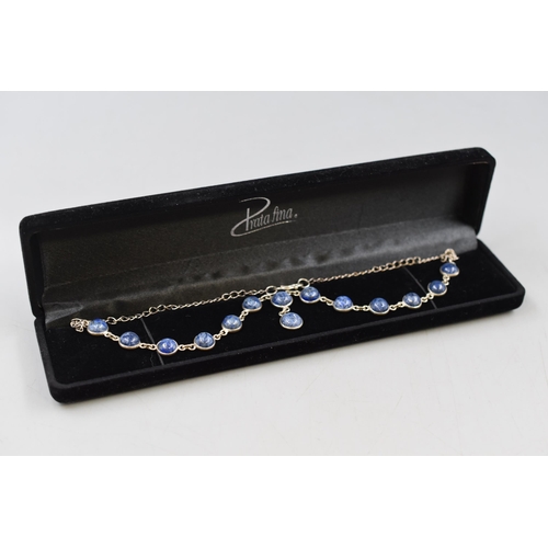 61 - A 925. Silver Blue Stoned Necklace In Presentation Box.