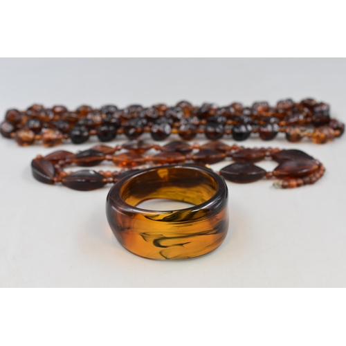 65 - Selection of Amber Style Necklaces and Bracelet