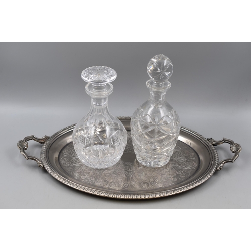 312 - Two Crystal Decanters and a Oval two Handled Silver Plated Serving Tray