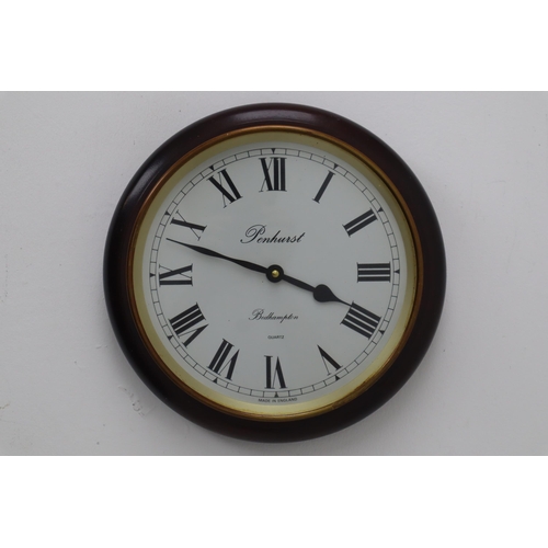 351 - Large Penhurst Bedhampton Quartz Movement wall hanging clock with mahogany and Brass surround tickin... 