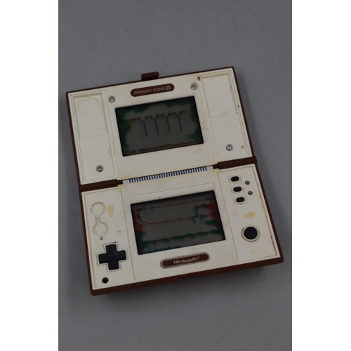 392 - A Nintendo Game and Watch Donkey Kong 2 Game, Powers on When Tested. No Battery Back.