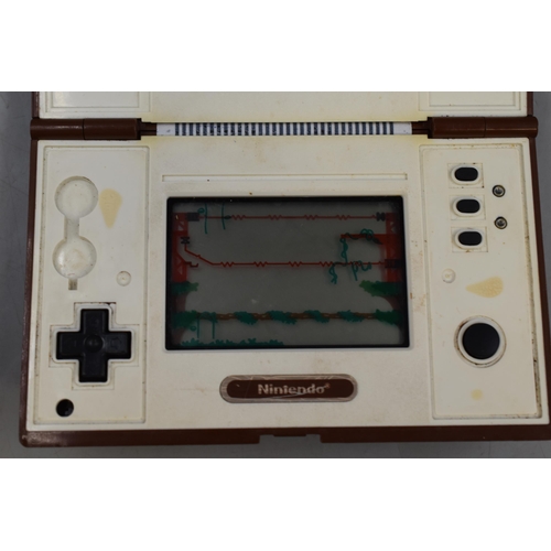 392 - A Nintendo Game and Watch Donkey Kong 2 Game, Powers on When Tested. No Battery Back.