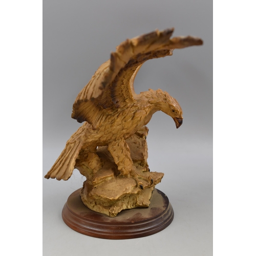 186 - Two Bird Statues to include Eagle and Robin both on wooden plinths largest 14.5