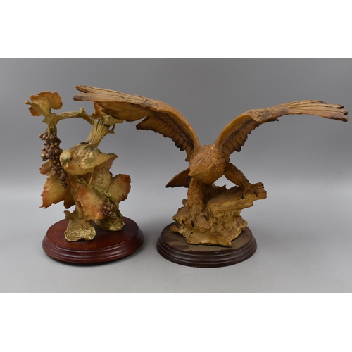 186 - Two Bird Statues to include Eagle and Robin both on wooden plinths largest 14.5