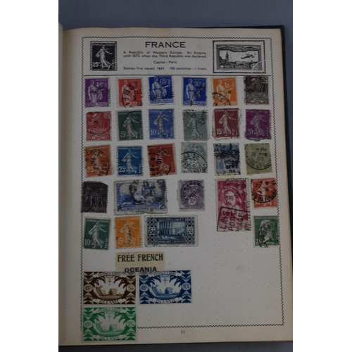 452 - The Movaleaf Illustrated Loose Stamp Album containing a large selection of Worldwide Stamps includin... 