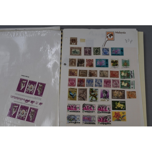 456 - Stamp Album containing a Selection of Definitive and Pictorial Stamps including UK, Malaya, Sarawak,... 