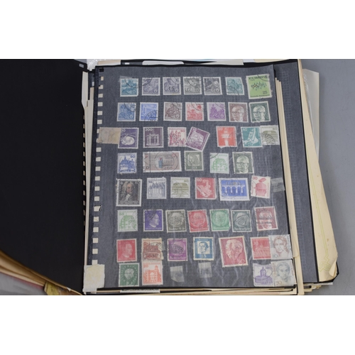 457 - Vintage Album containing a large selection of both Definitive and Pictorial Worldwide stamps includi... 