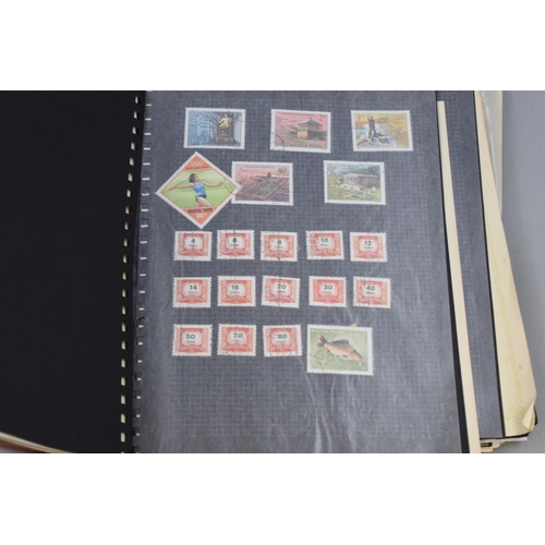 457 - Vintage Album containing a large selection of both Definitive and Pictorial Worldwide stamps includi... 